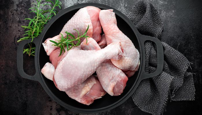 cocinar piernas de pollo